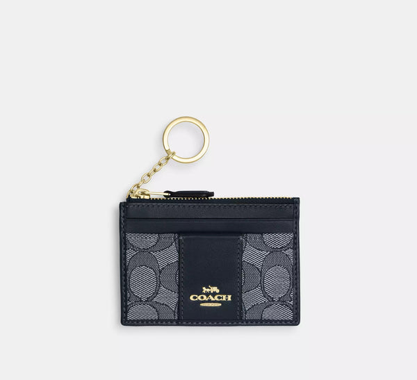 Coach Tarjetero Mini Skinny Id con monograma Jacquard